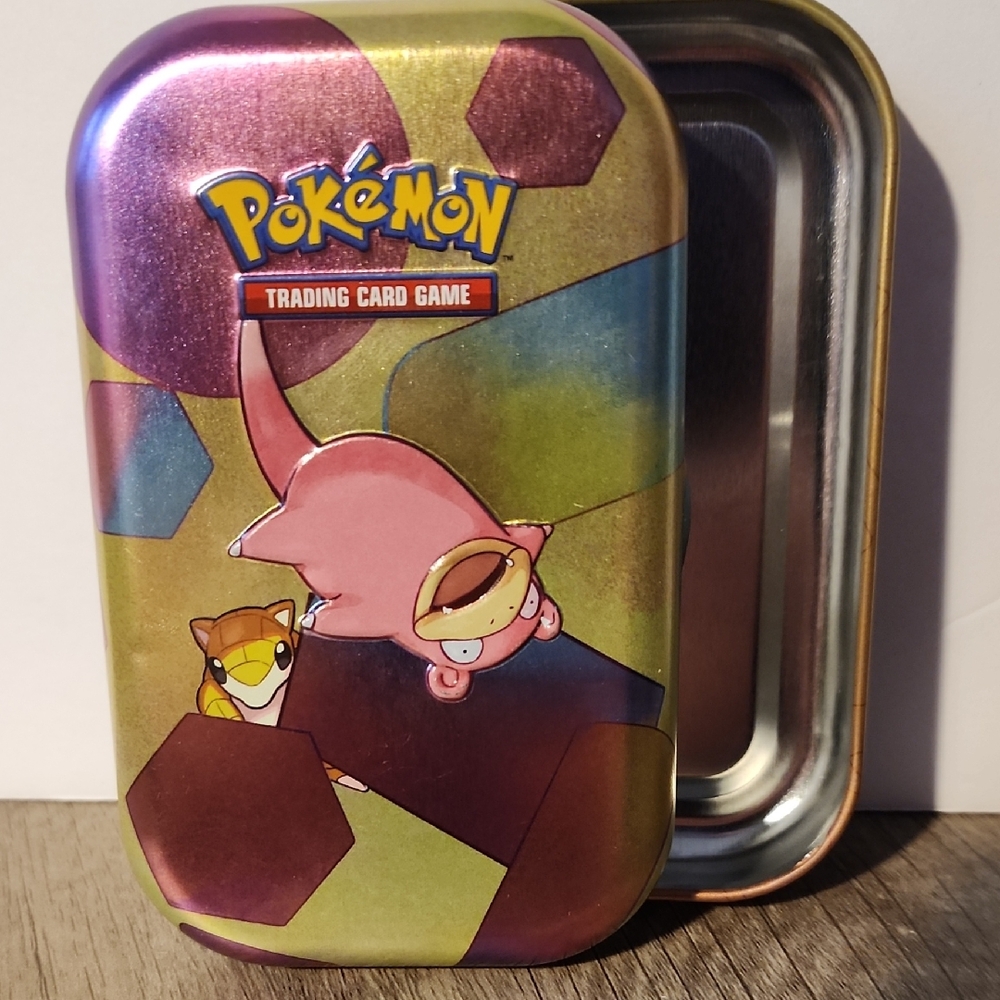 Pokémon Trading Card Game Tin featuring Slowpoke and Sandshrew